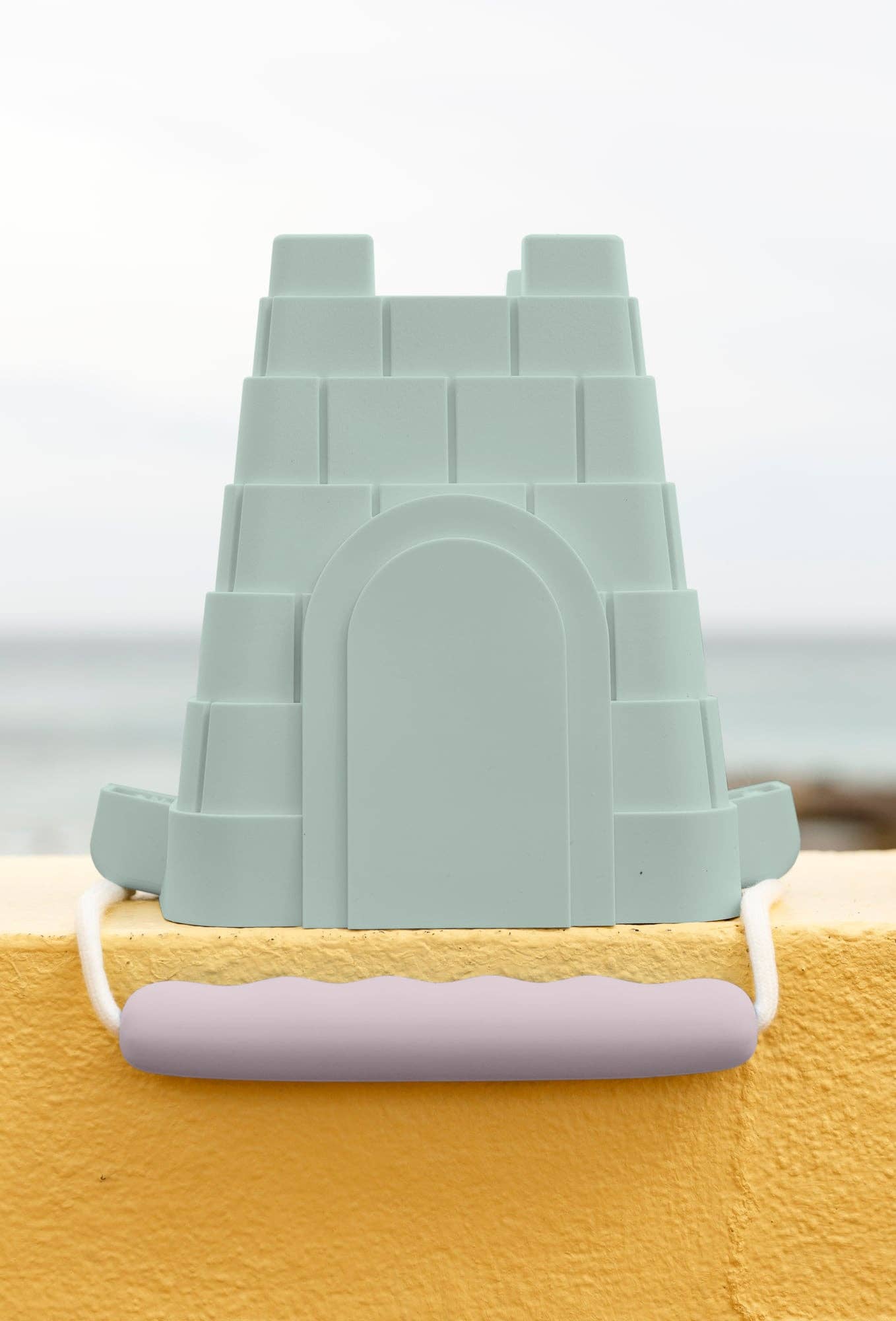 Coast Kids Silicone Beach Bucket - Clovelly Castle in tan with sage handle