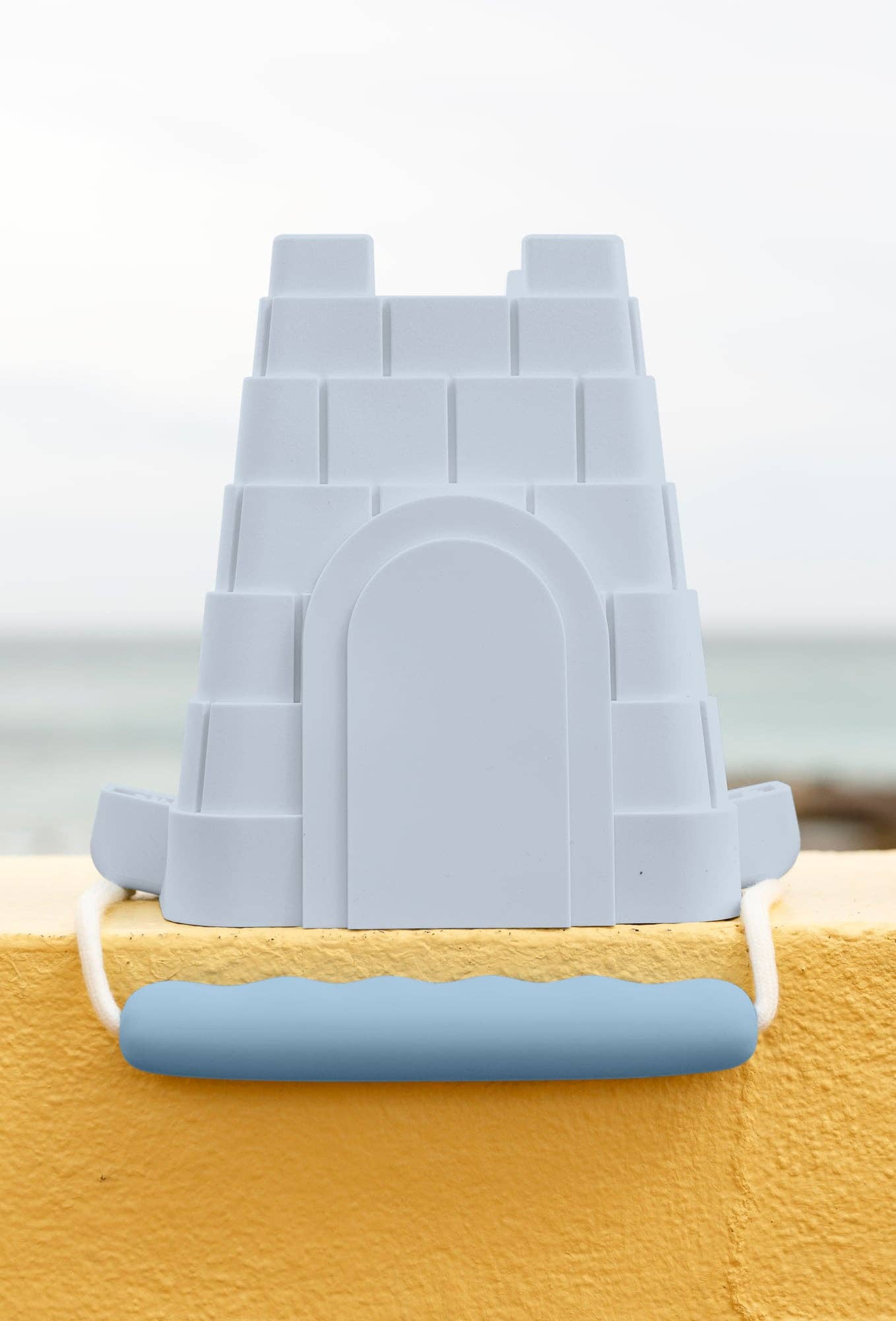 Coast Kids Silicone Beach Bucket - Clovelly Castle in tan with sage handle