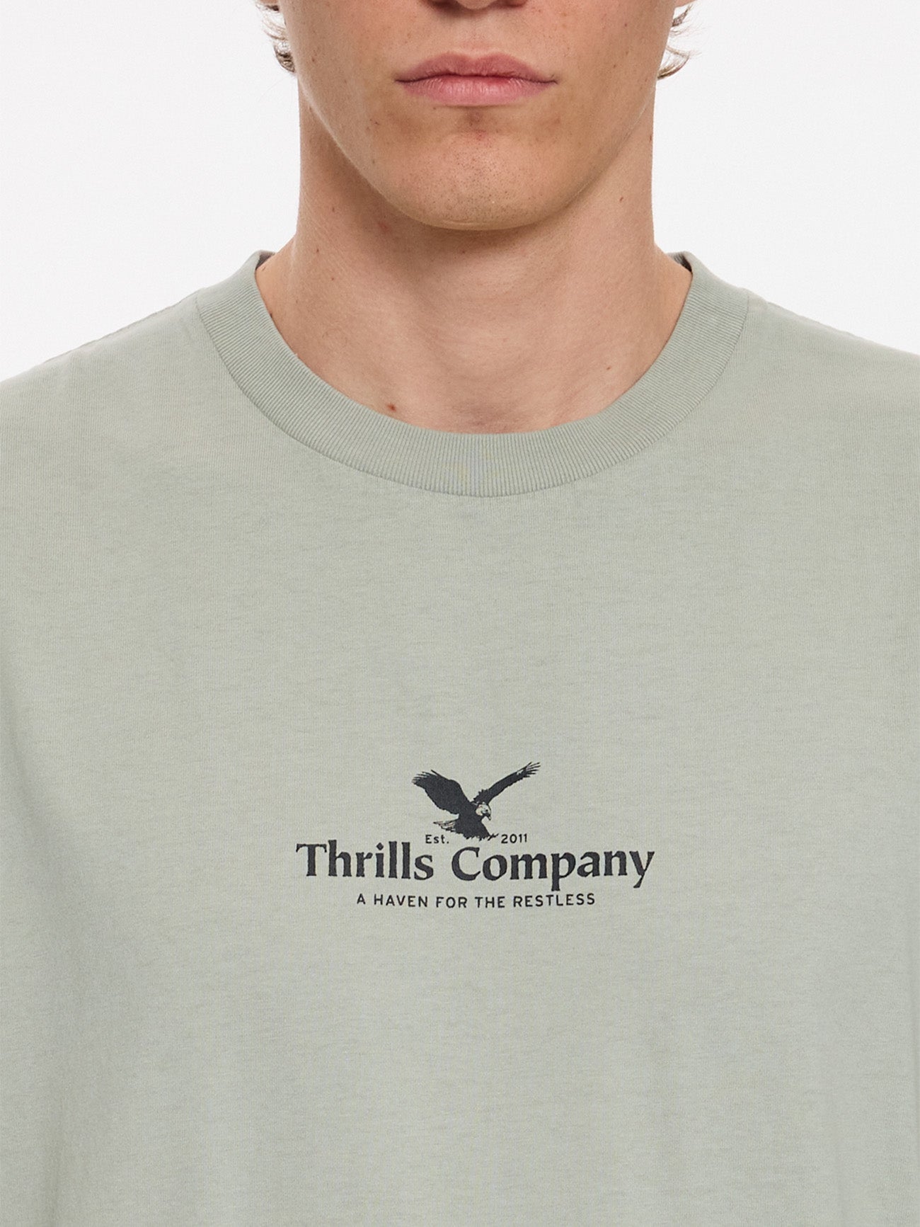 Thrills Co A Haven For The Restless Merch Fit Muscle Tee - Dirty Sage in Dirty Sage