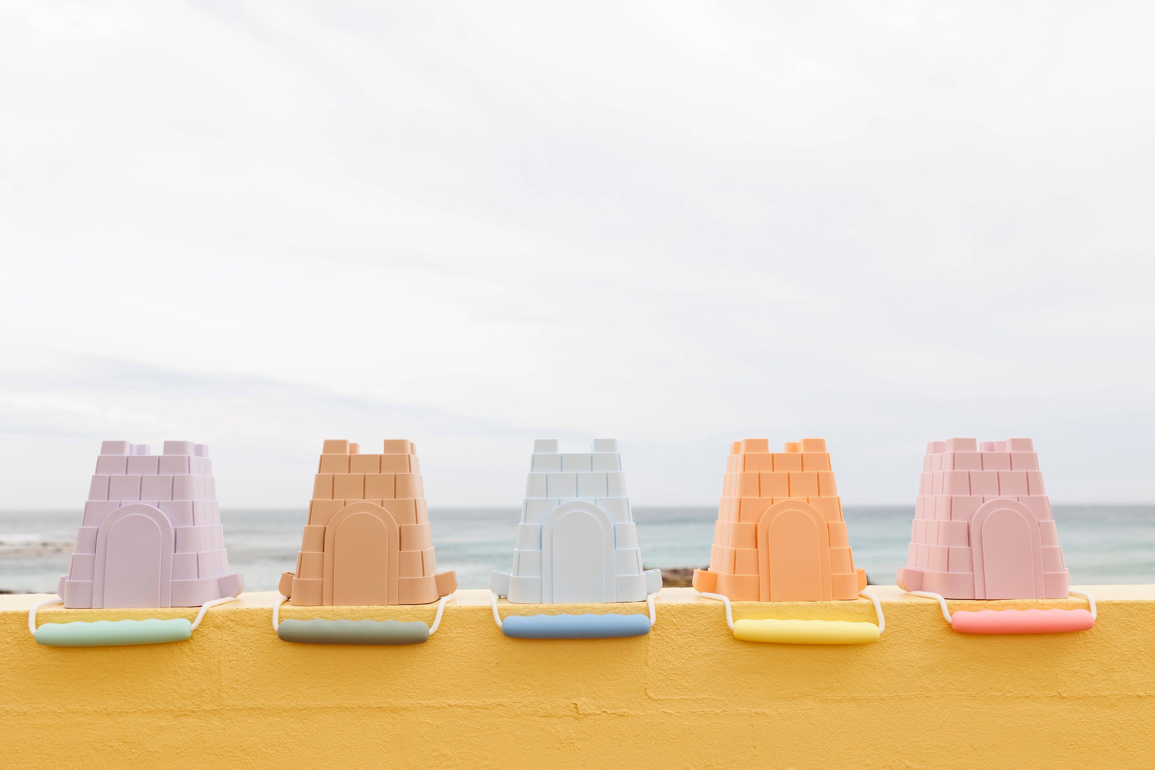 Coast Kids Silicone Beach Bucket - Clovelly Castle in tan with sage handle
