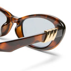 Le Specs Unreal in TOFFEE TORT